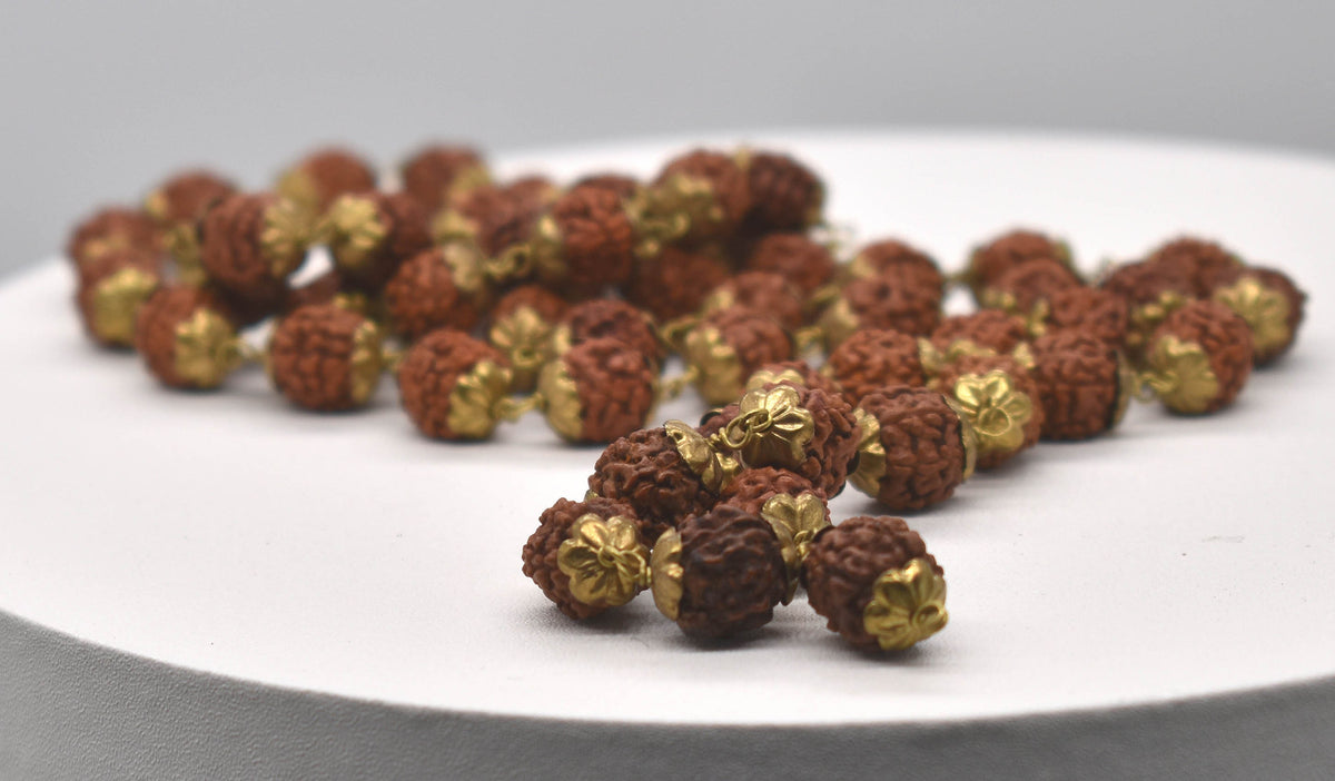 Natural Rudrakshas in Brass
