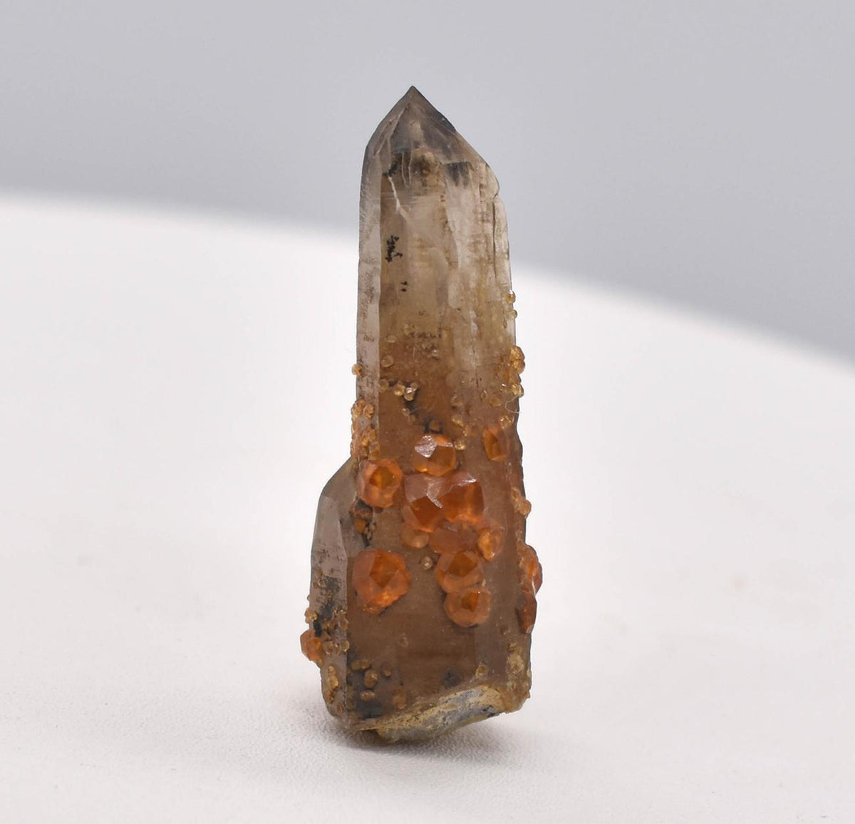 Orange Garnets on Smoky Quartz