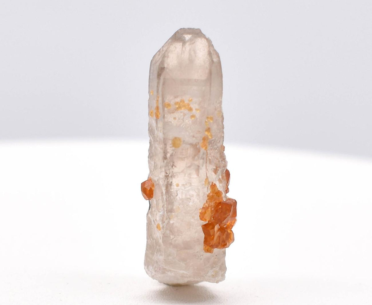 Orange Garnets on Smoky Quartz