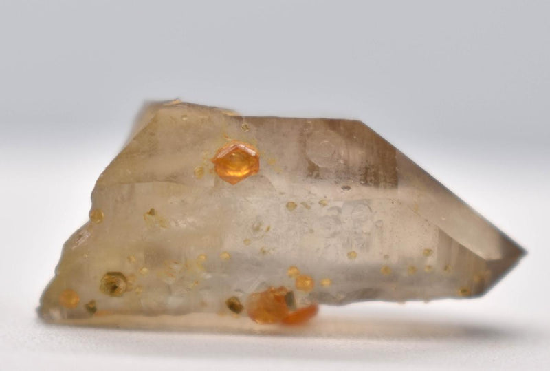 Orange Garnets on Smoky Quartz