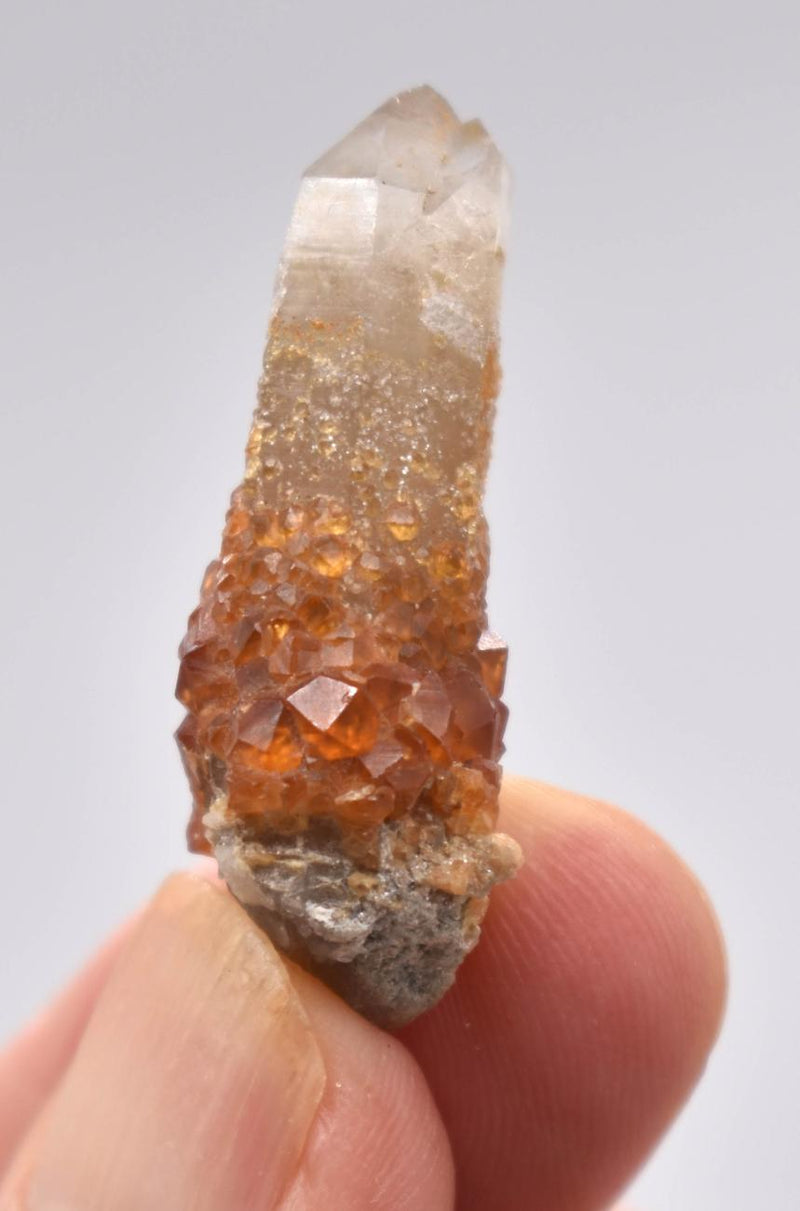 Orange Garnets on Smoky Quartz