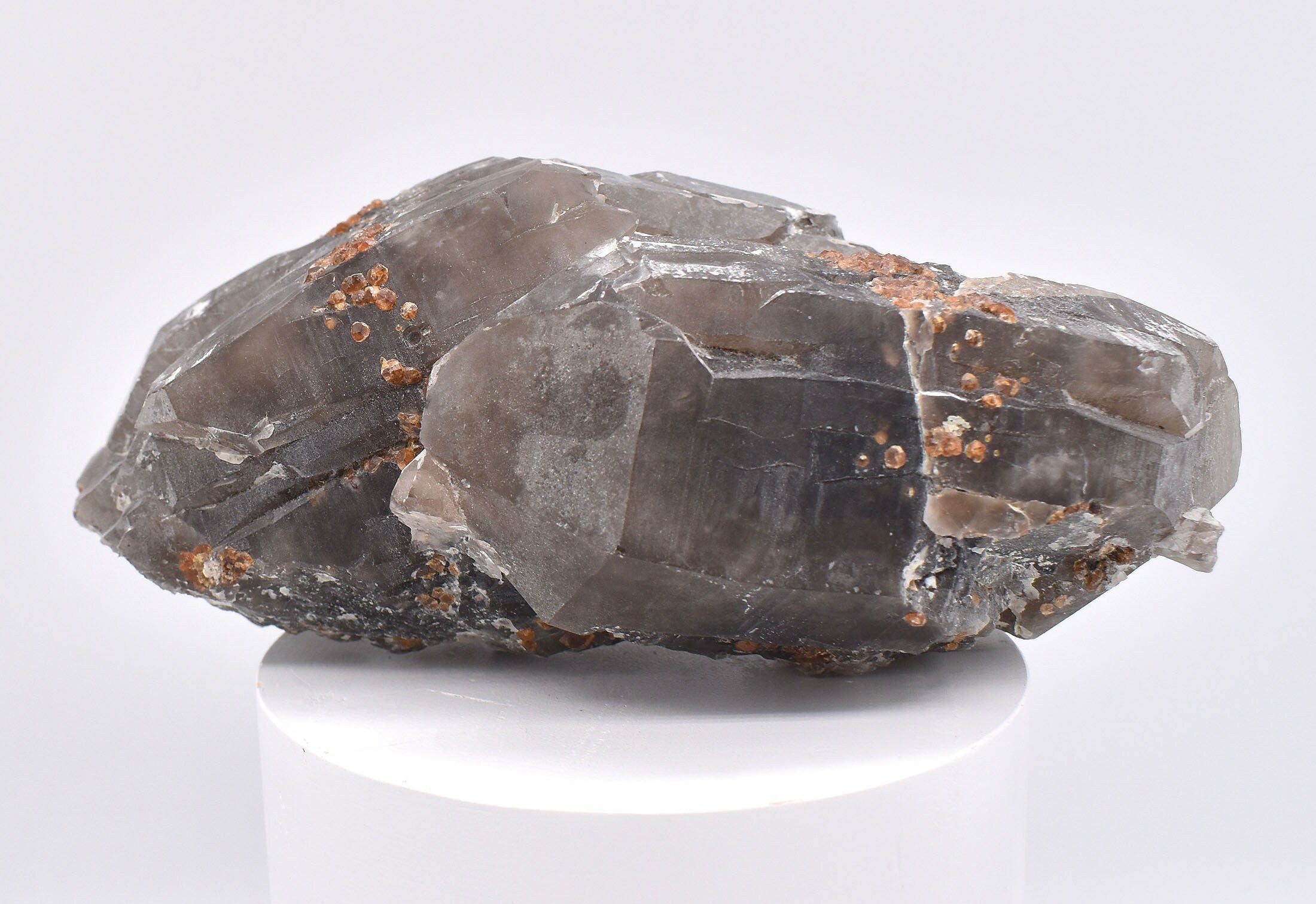 Spessartine Garnets on Smokey Quartz