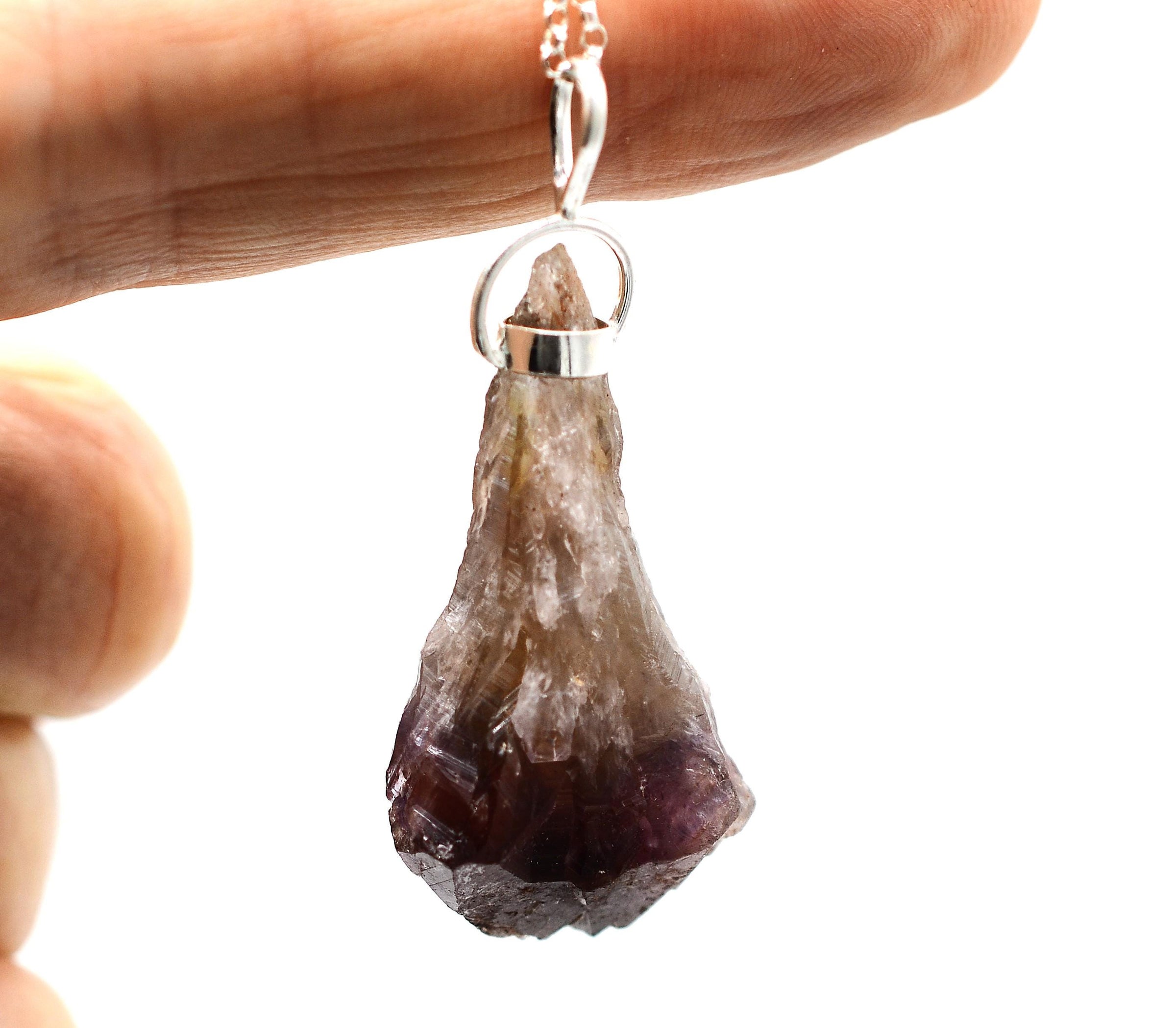 Raw Super 7 Silver Pendant: Ethically Mined Natural Crystal