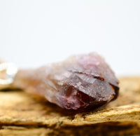 Raw Super 7 Silver Pendant: Ethically Mined Natural Crystal