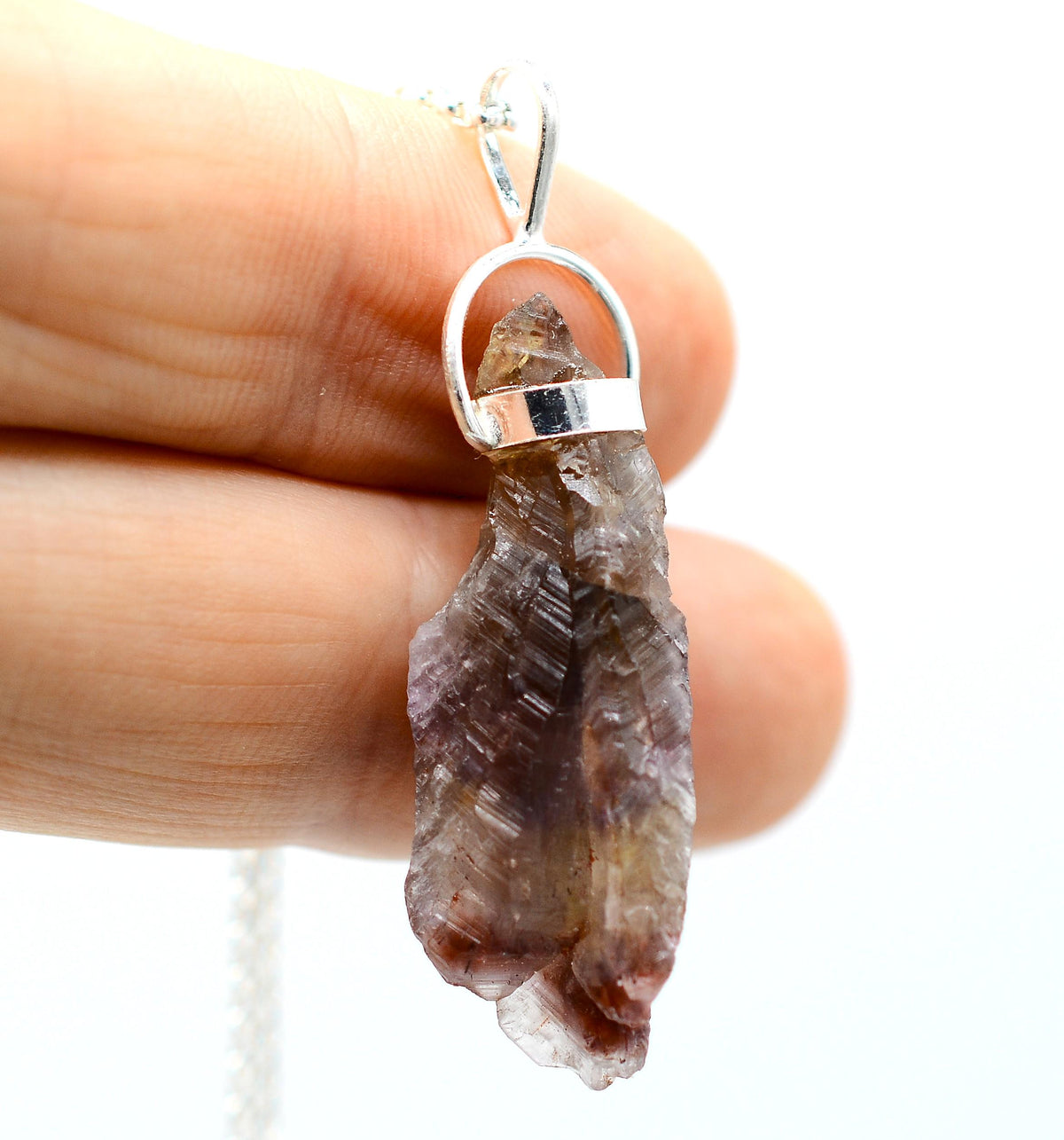 Raw Super 7 Silver Pendant: Ethically Mined Natural Crystal