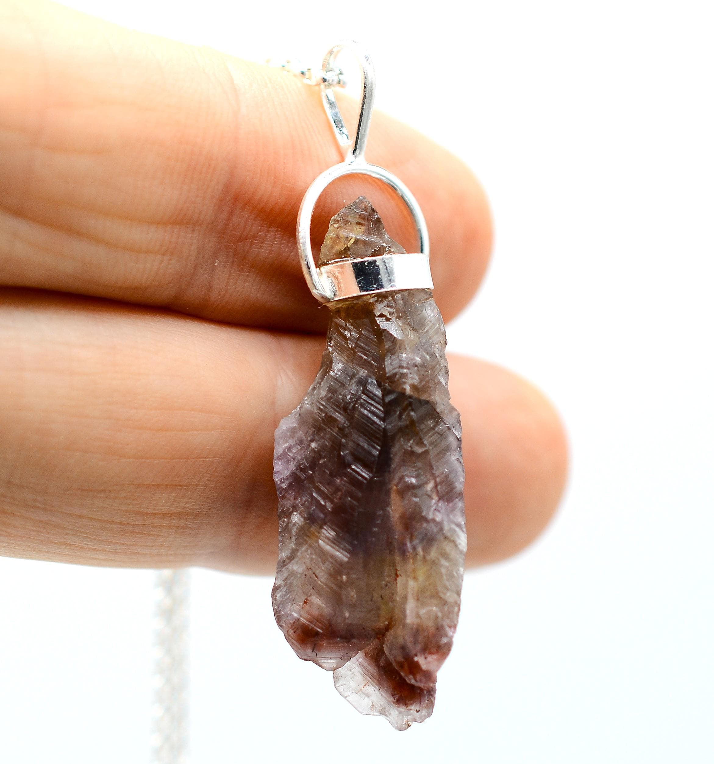 Raw Super 7 Silver Pendant: Ethically Mined Natural Crystal