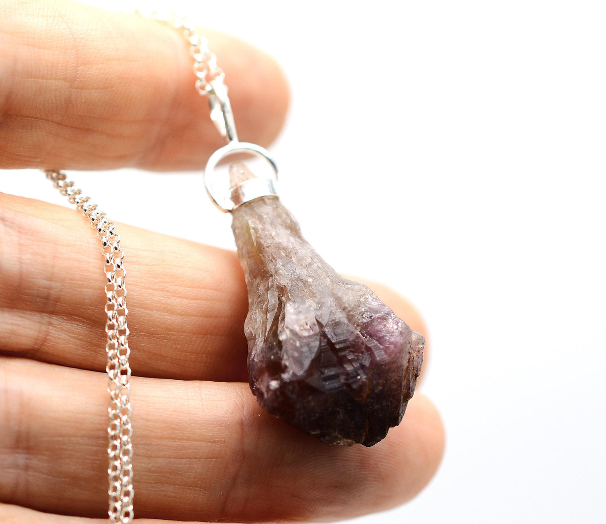Raw Super 7 Silver Pendant: Ethically Mined Natural Crystal