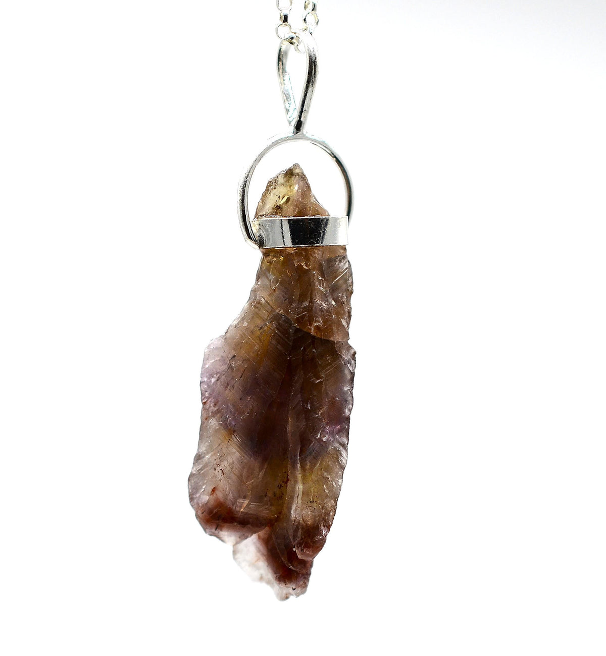 Raw Super 7 Silver Pendant: Ethically Mined Natural Crystal