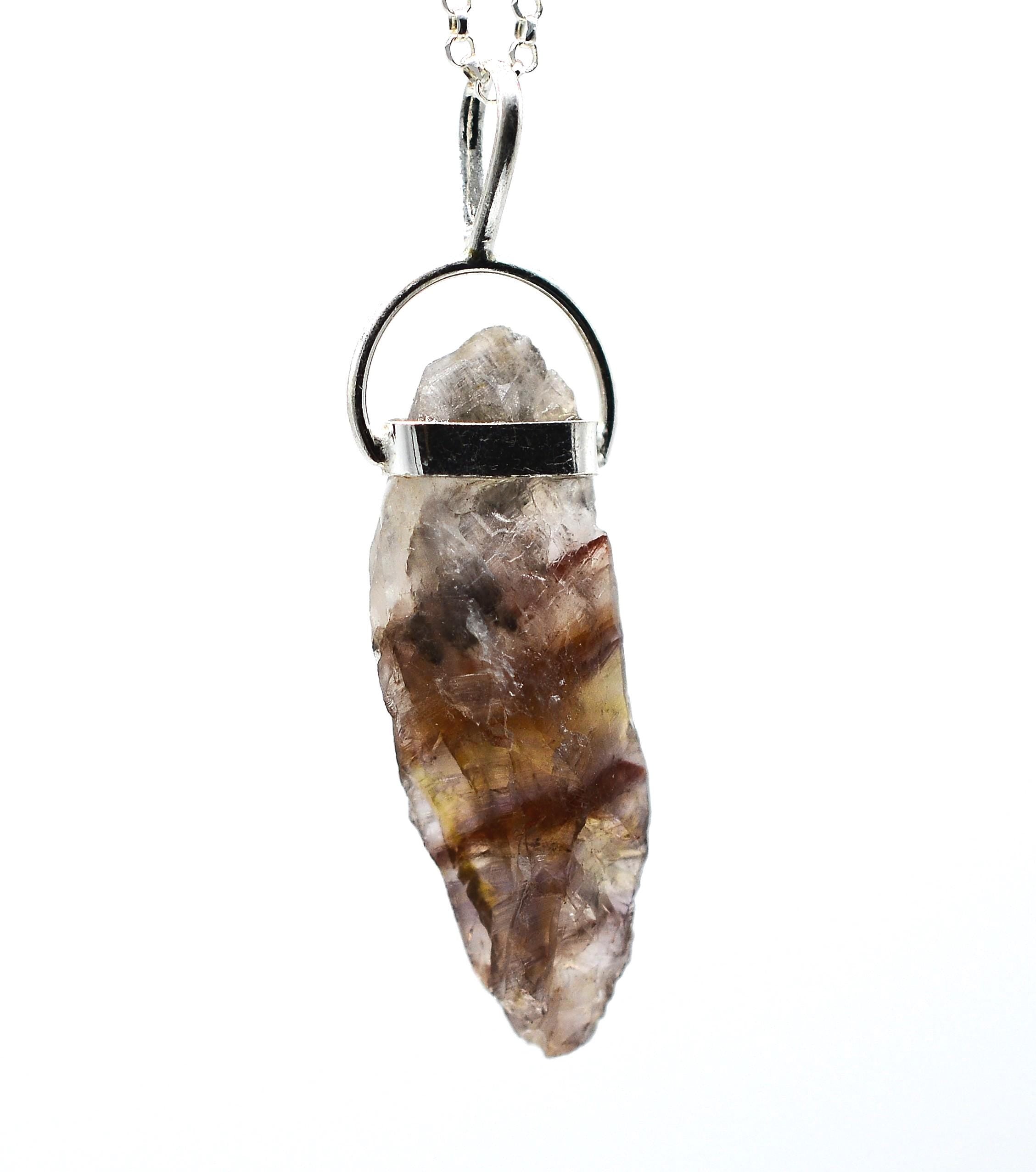 Super 7 Silver Pendant: Ethically Mined Natural Crystal