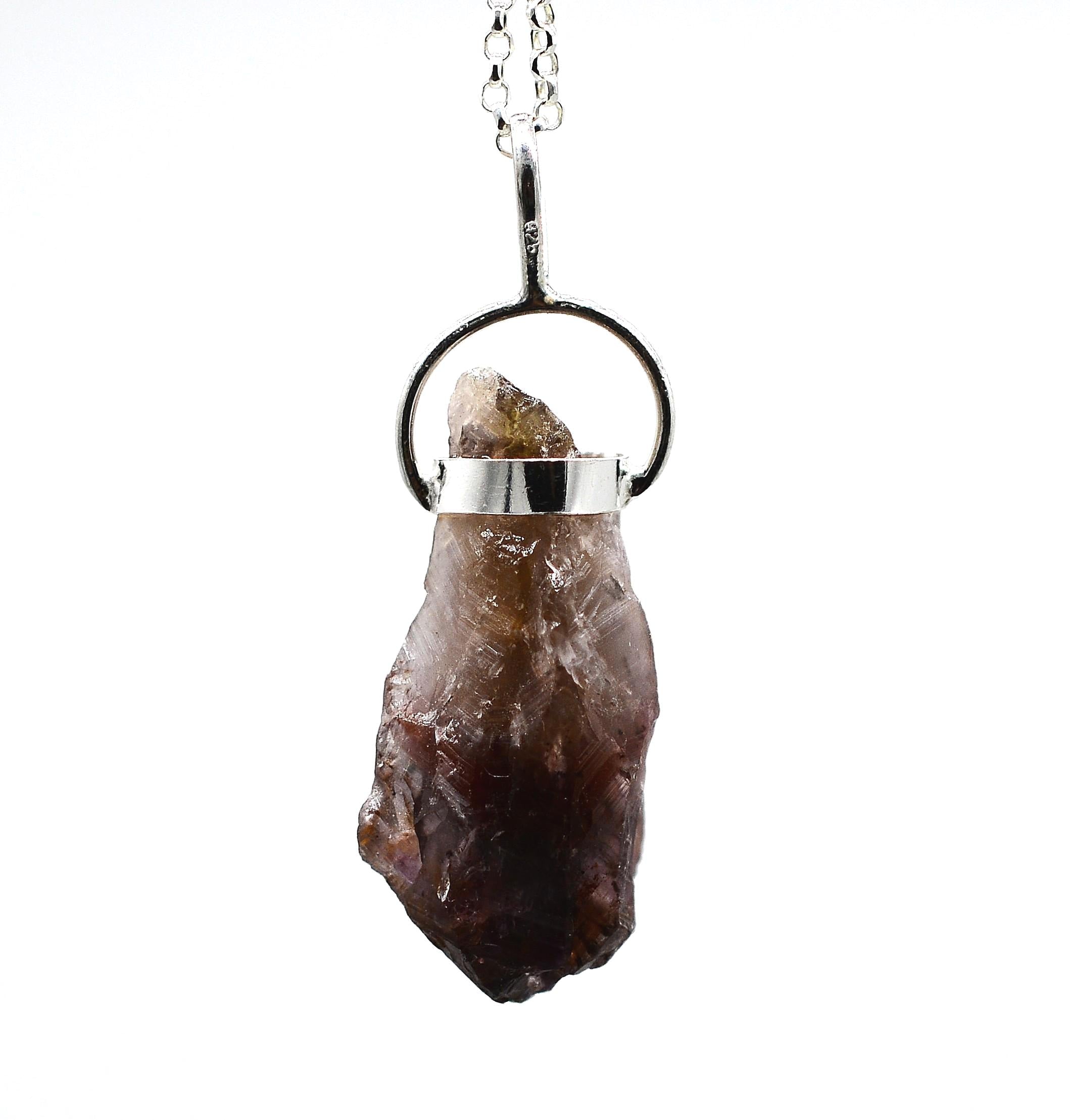 Super 7 Silver Pendant: Ethically Mined Natural Crystal