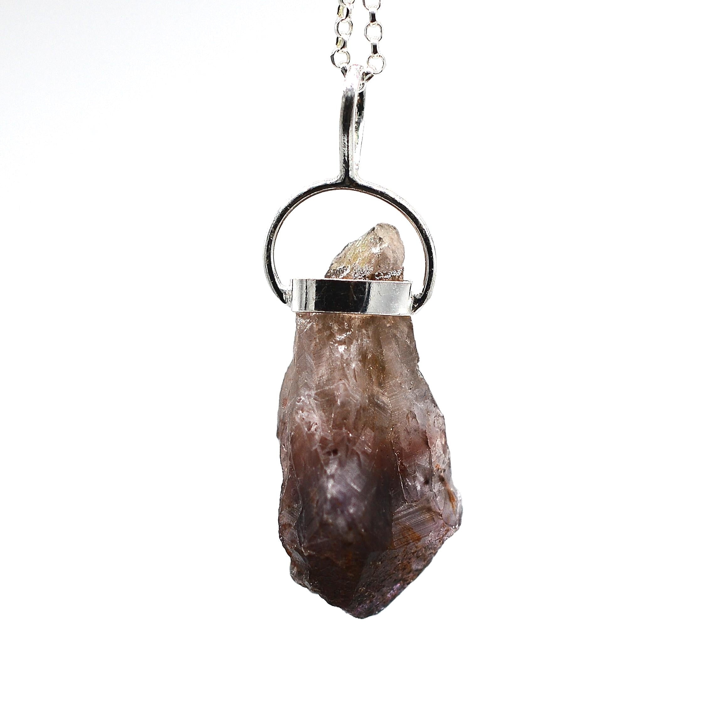 Super 7 Silver Pendant: Ethically Mined Natural Crystal