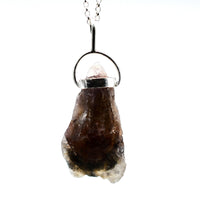 Raw Super 7 Silver Pendant: Ethically Mined Natural Crystal