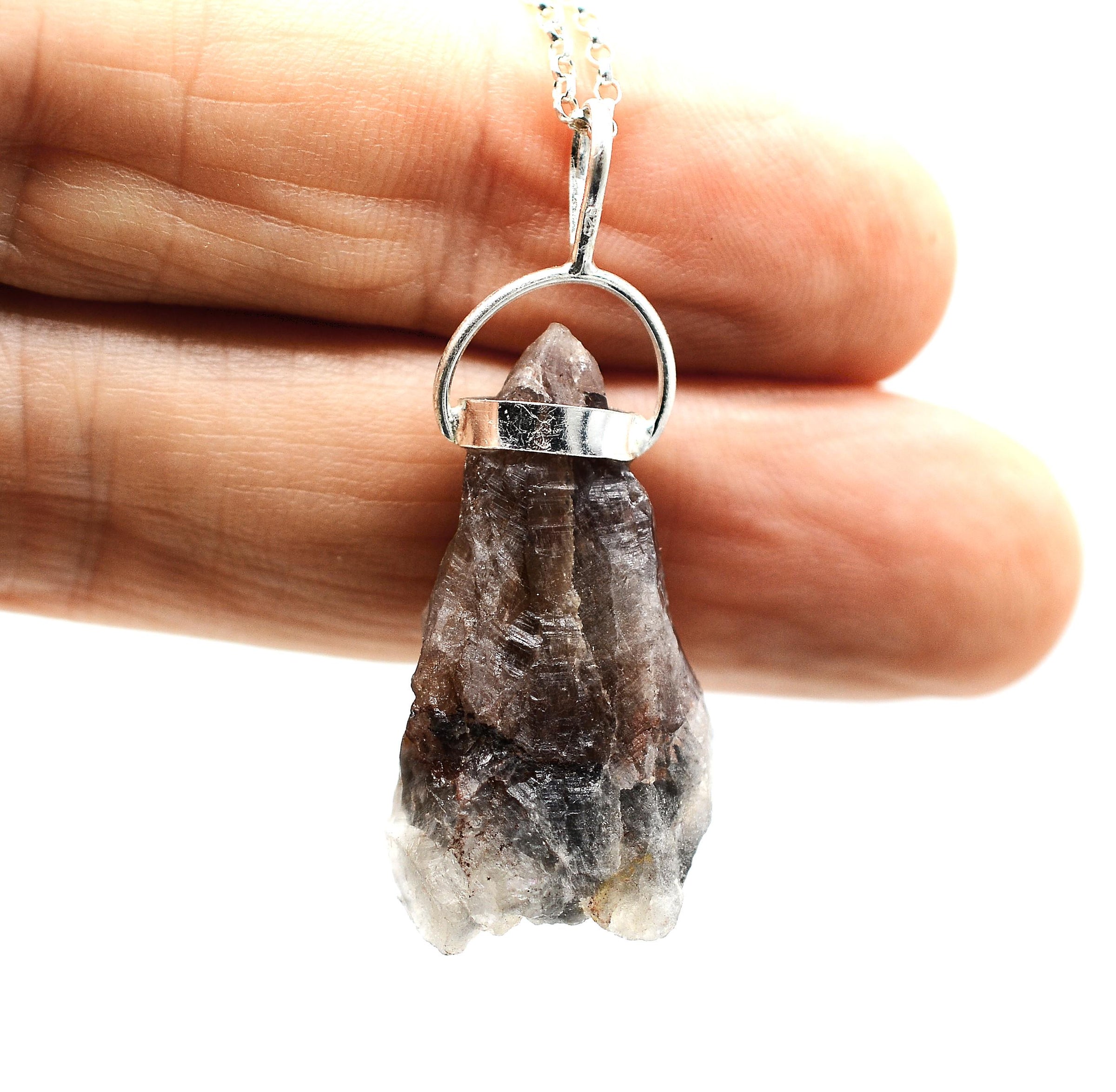 Raw Super 7 Silver Pendant: Ethically Mined Natural Crystal