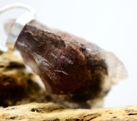 Raw Super 7 Silver Pendant: Ethically Mined Natural Crystal