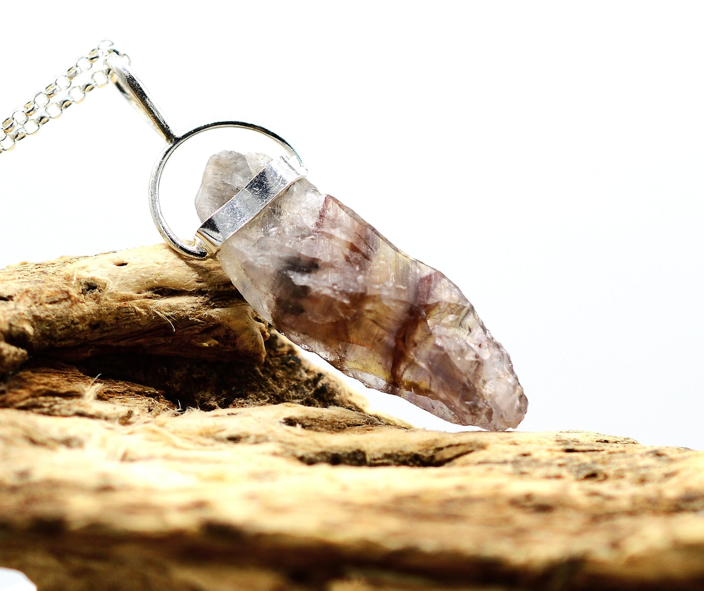Super 7 Silver Pendant: Ethically Mined Natural Crystal