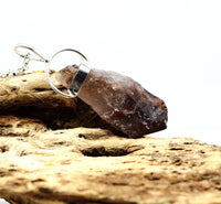 Super 7 Silver Pendant: Ethically Mined Natural Crystal