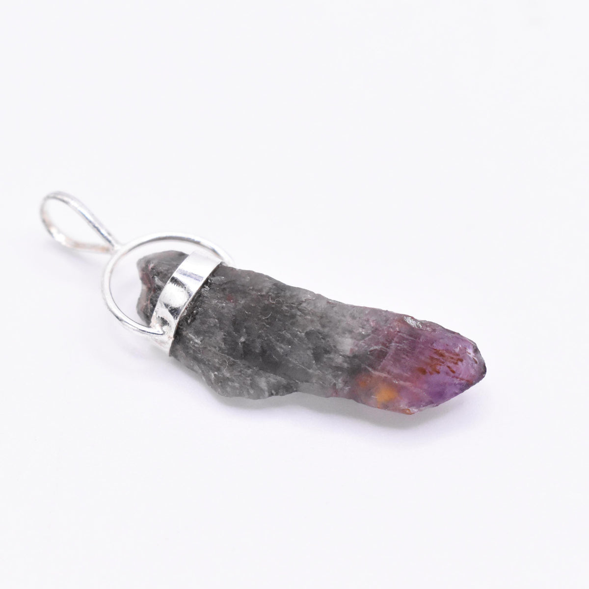 Super 7 Silver Pendant: Ethically Mined Natural Crystal