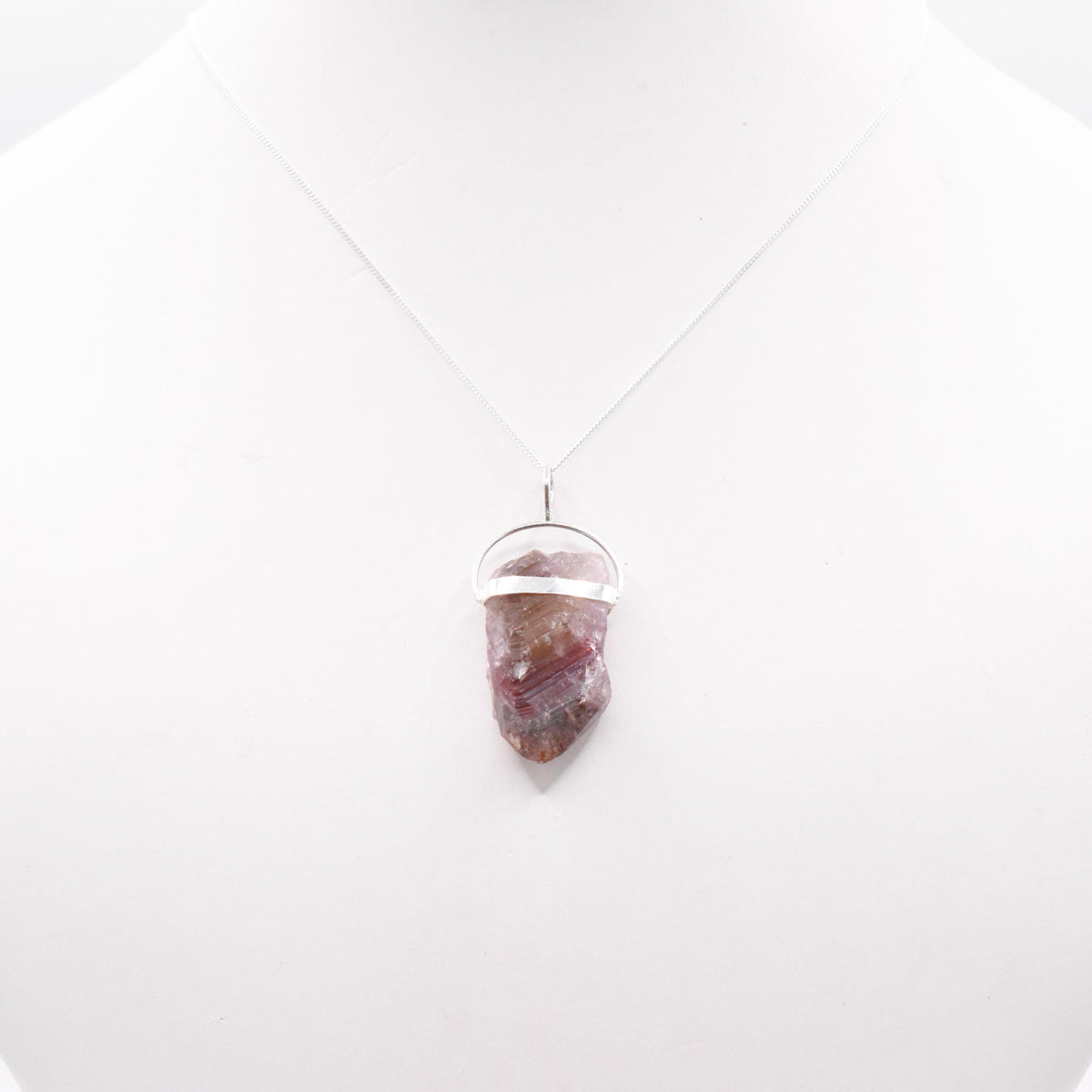 Super 7 Silver Pendant: Ethically Mined Natural Crystal