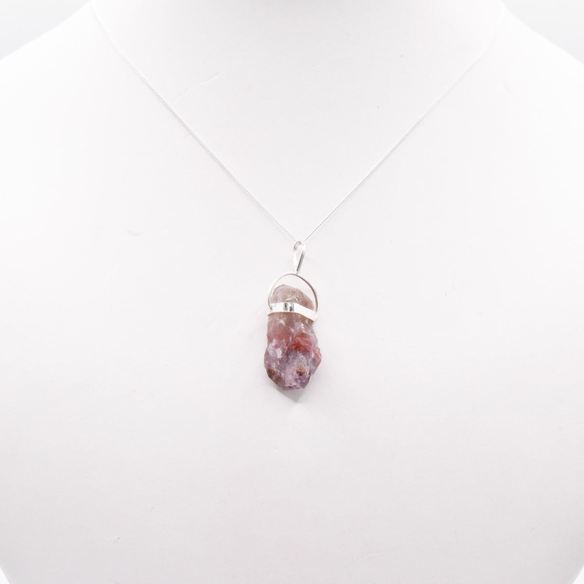 Super 7 Silver Pendant: Ethically Mined Natural Crystal