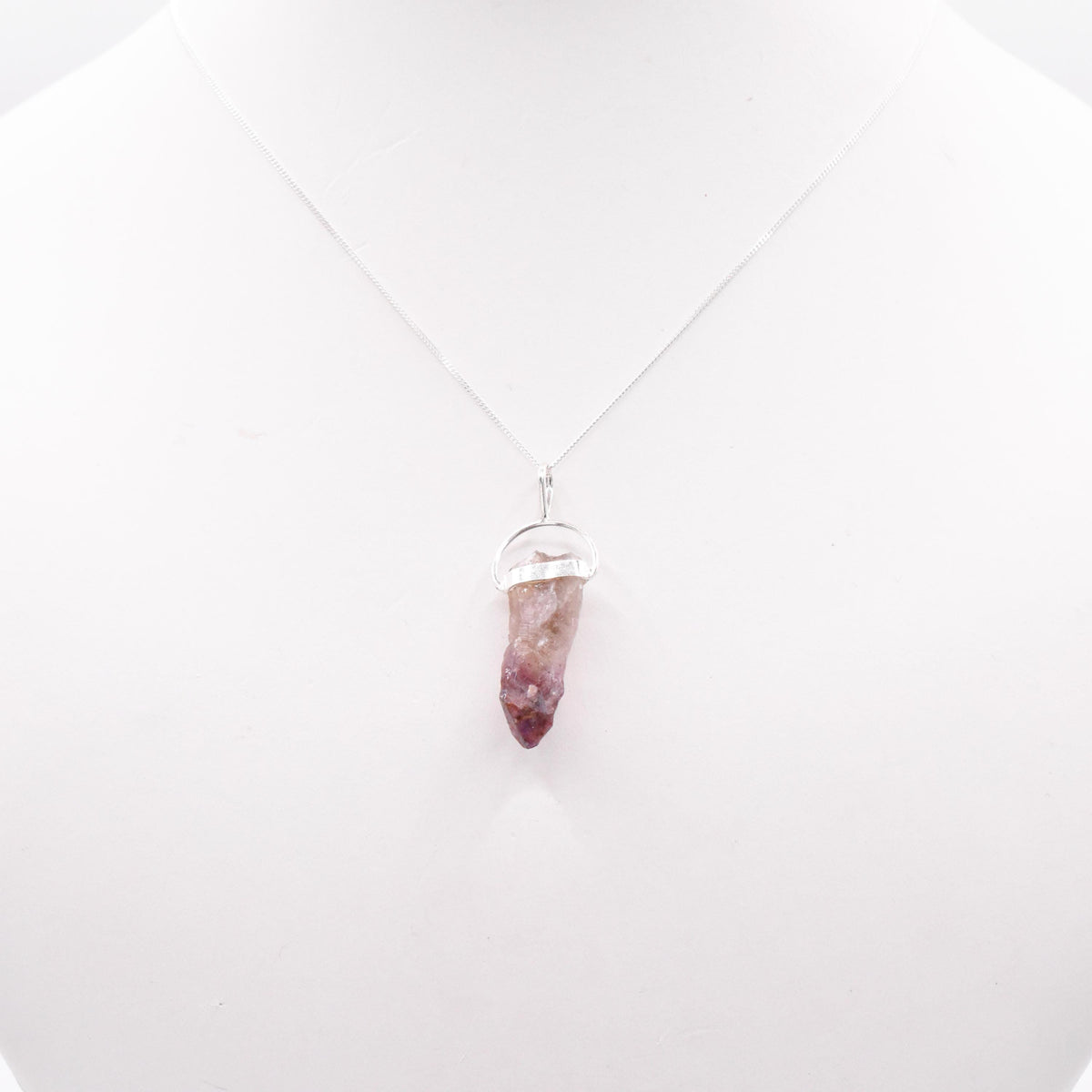 Super 7 Silver Pendant: Ethically Mined Natural Crystal