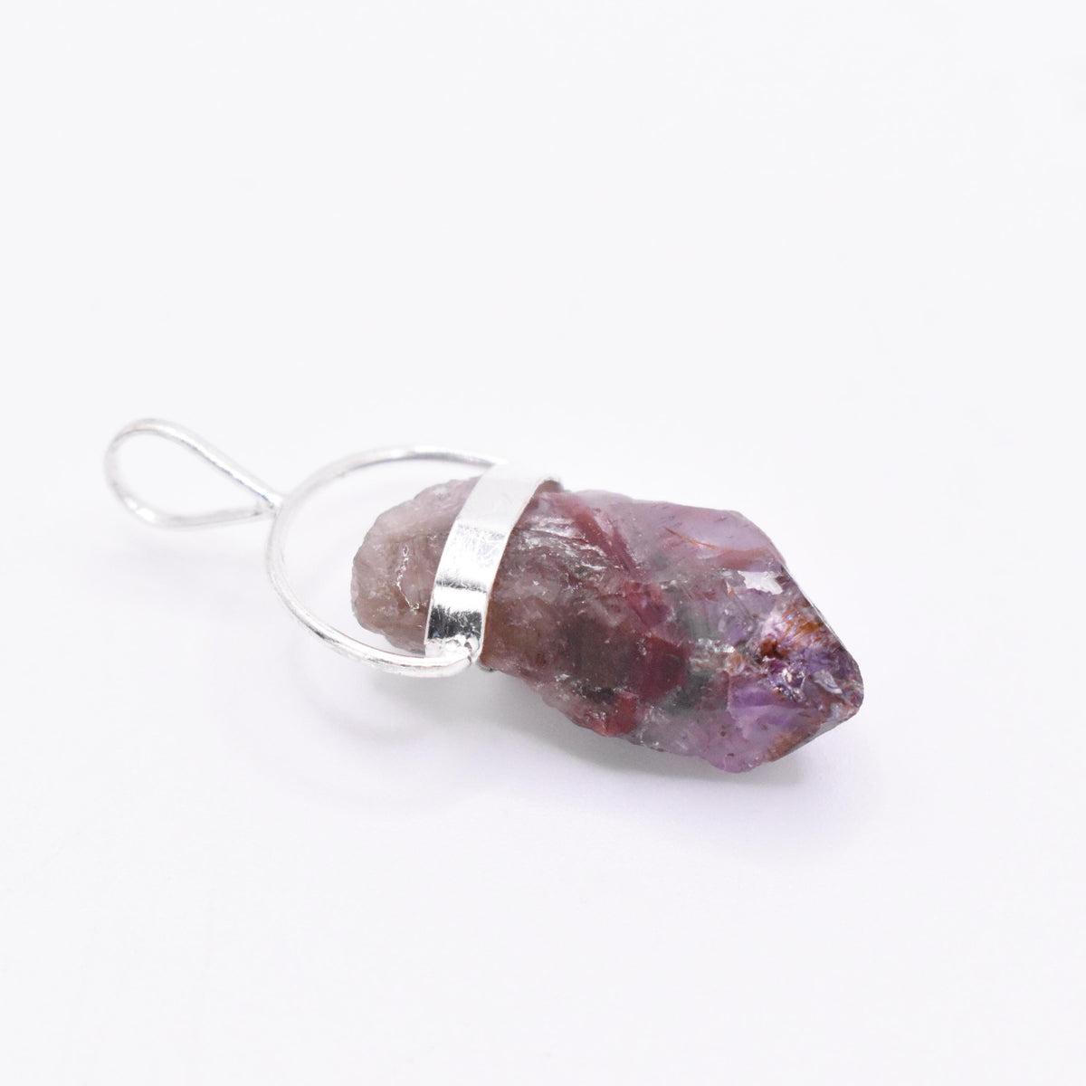 Super 7 Silver Pendant: Ethically Mined Natural Crystal