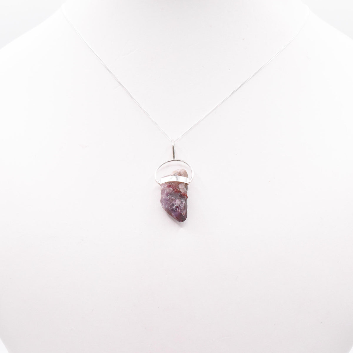 Super 7 Silver Pendant: Ethically Mined Natural Crystal