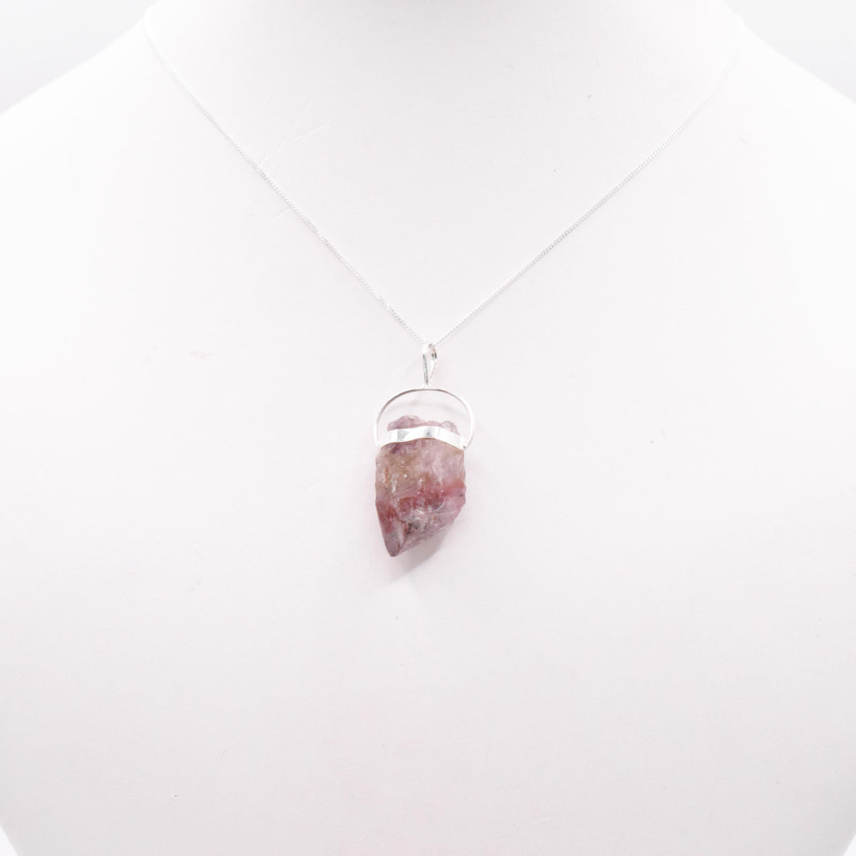 Super 7 Silver Pendant: Ethically Mined Natural Crystal
