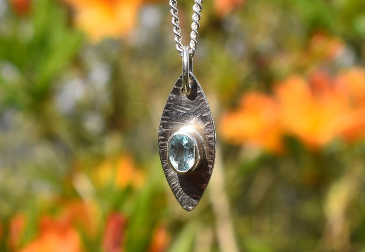 Handmade Blue-Eye Topaz Silver Pendant