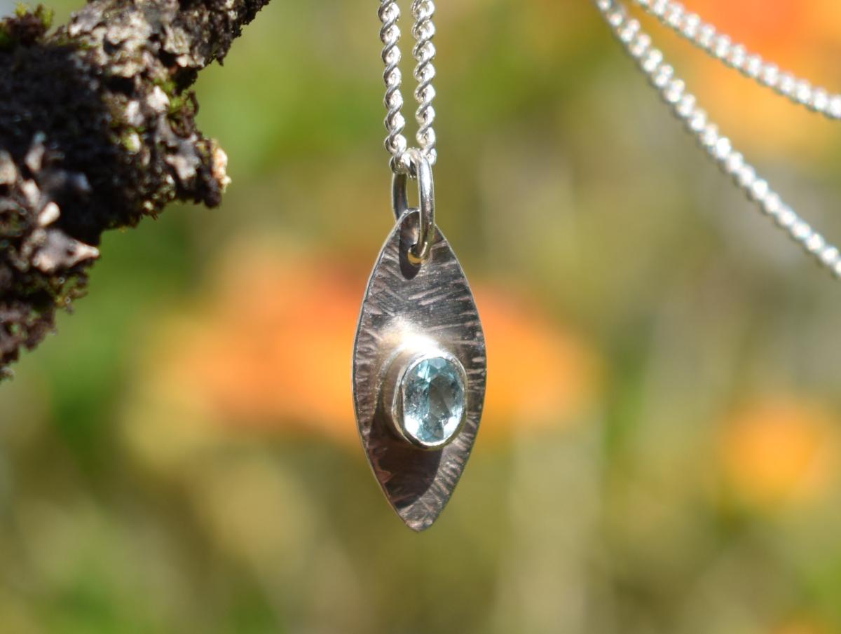 Handmade Blue-Eye Topaz Silver Pendant